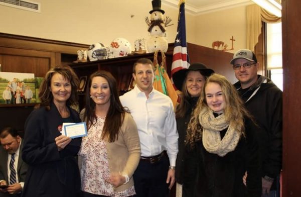"Here we are when we picked up our inauguration tickets at Congressman Markwayne Mullin's office. Robin and Kaitlyn Anderson, Christie and Markwayne Mullin, Gina and Scot Nelson." Photo via Robin Anderson
